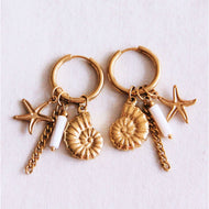 Ohrring mit Muschel, Seestern und Mutter des Perlenrohrs