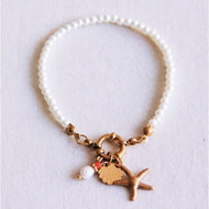 Perlenarmband mit Seestern, Schale und Perle