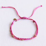 Vierfach -Satinarmband mit Perlen - Fuchsia